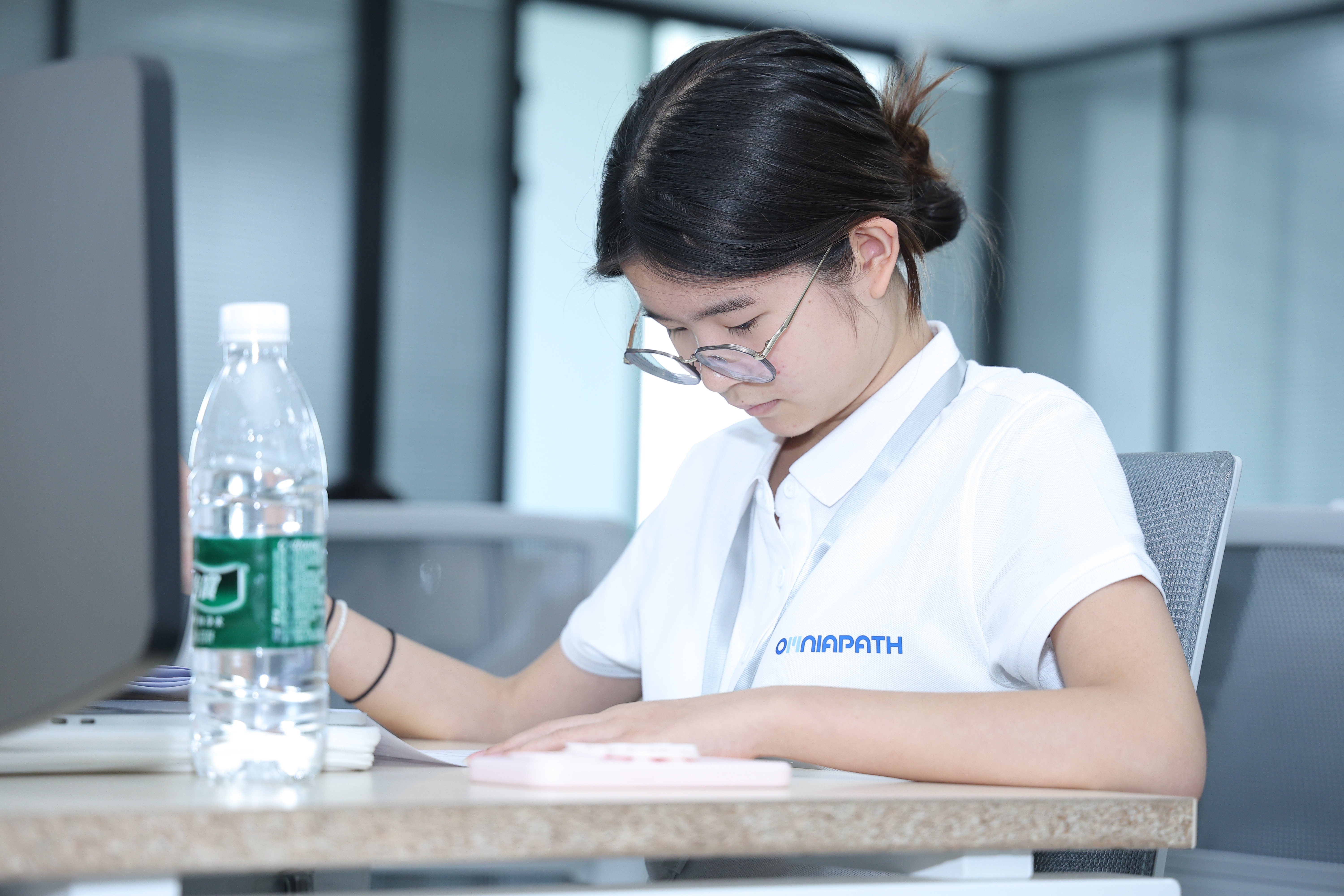 An OMNIAPATH student working through a venture workshop